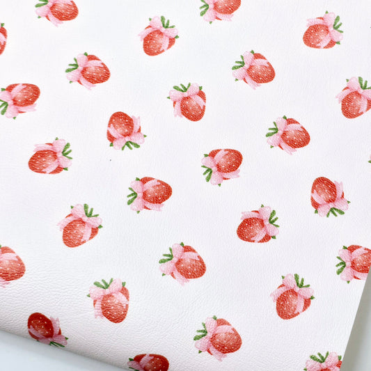 Strawberry bows on pale pink Artisan Leatherette