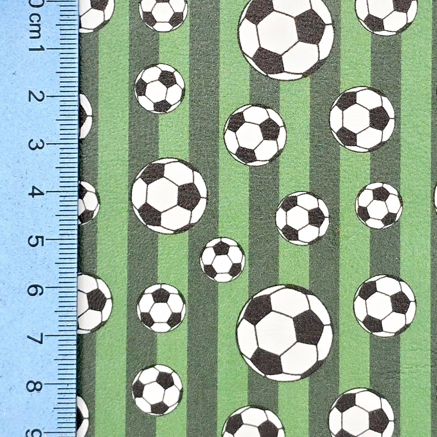 Footballs on Green Stripes Artisan Leatherette