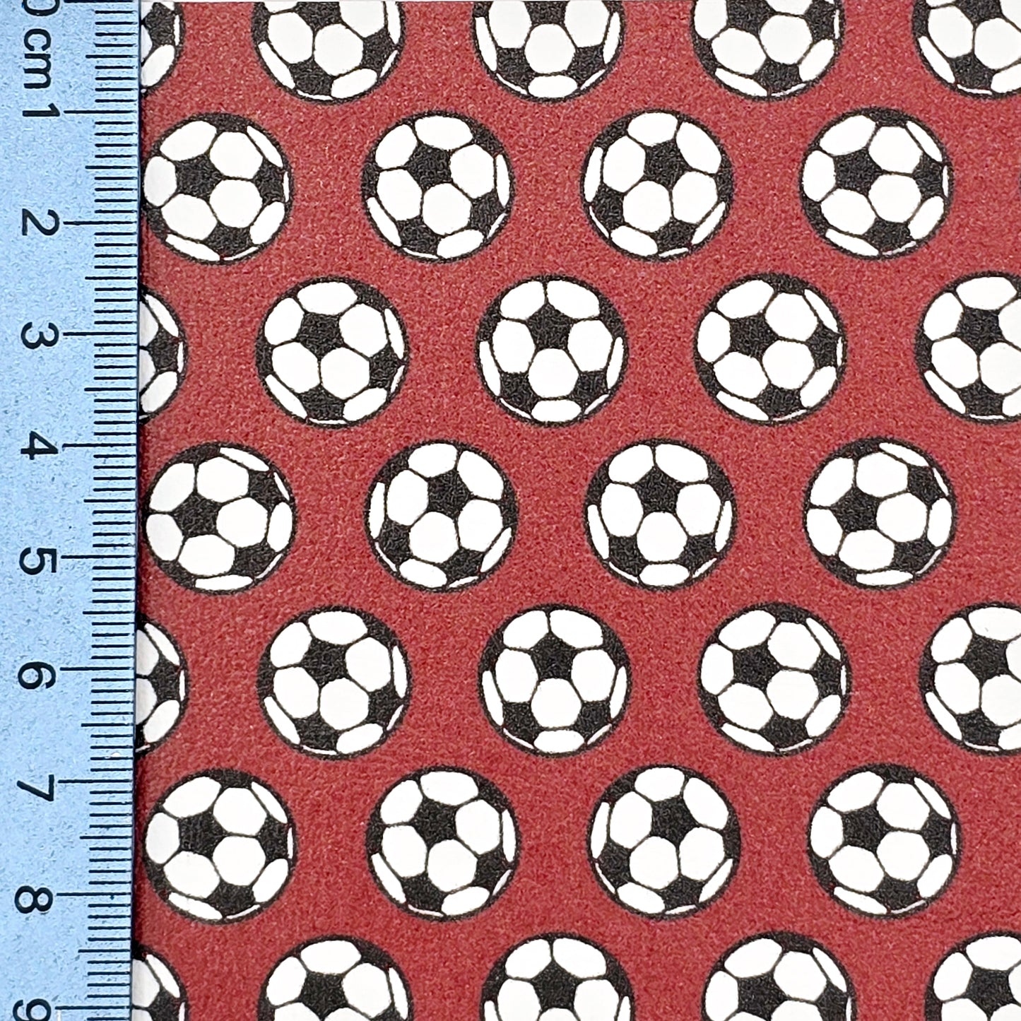 Footballs on Red Artisan Leatherette