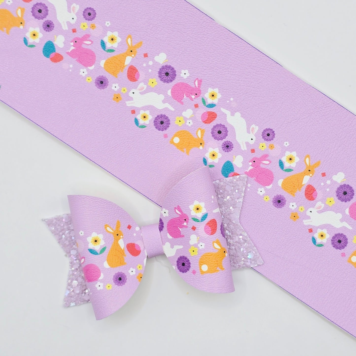 Bunny Hop on Lilac Leatherette Fabric Roll